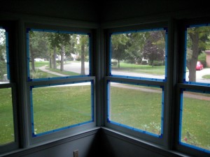 Painters Tape around windows in Painting Trim