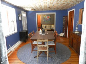Blue Painted Kitchen with Matching Floors and Furniture in Painting to Brighten Any Room