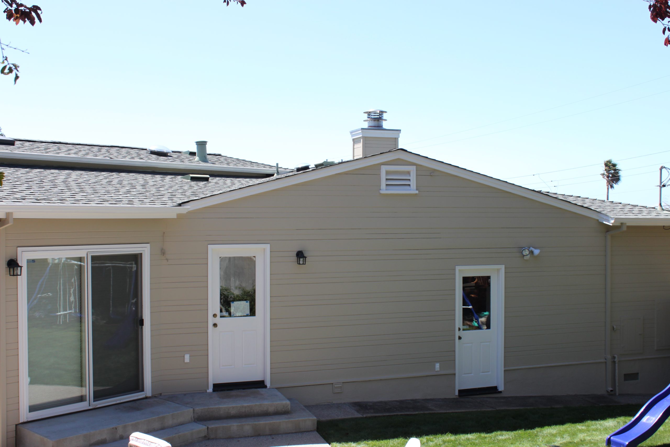 Exterior house painting in progress